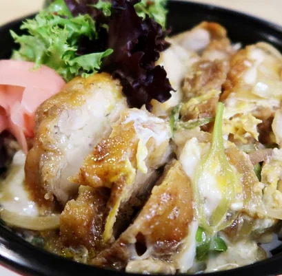 Fried chicken rice bowl with egg and sweet soy sauce
