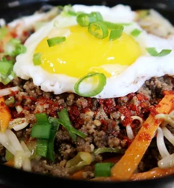 Asian ground beef saute with a sunny-side-up egg