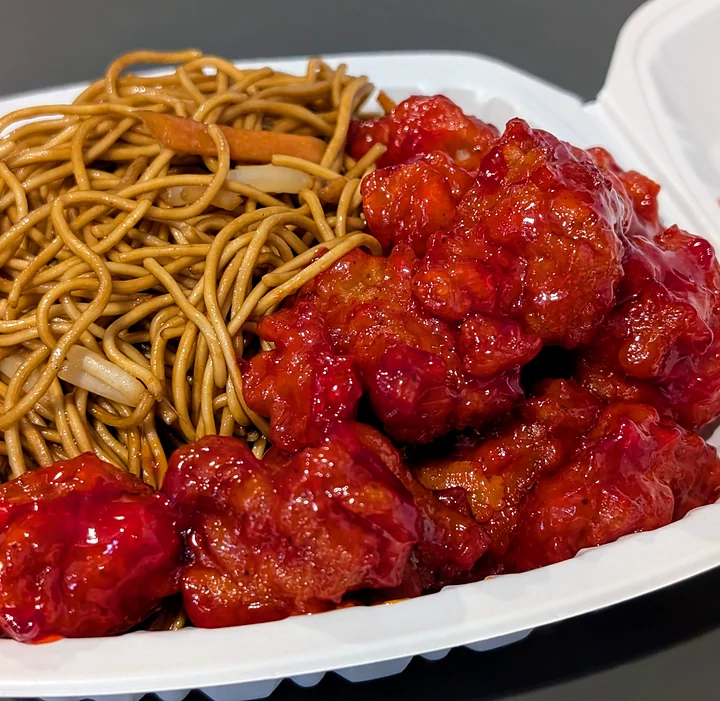Sweet and sour pork with fried noodles